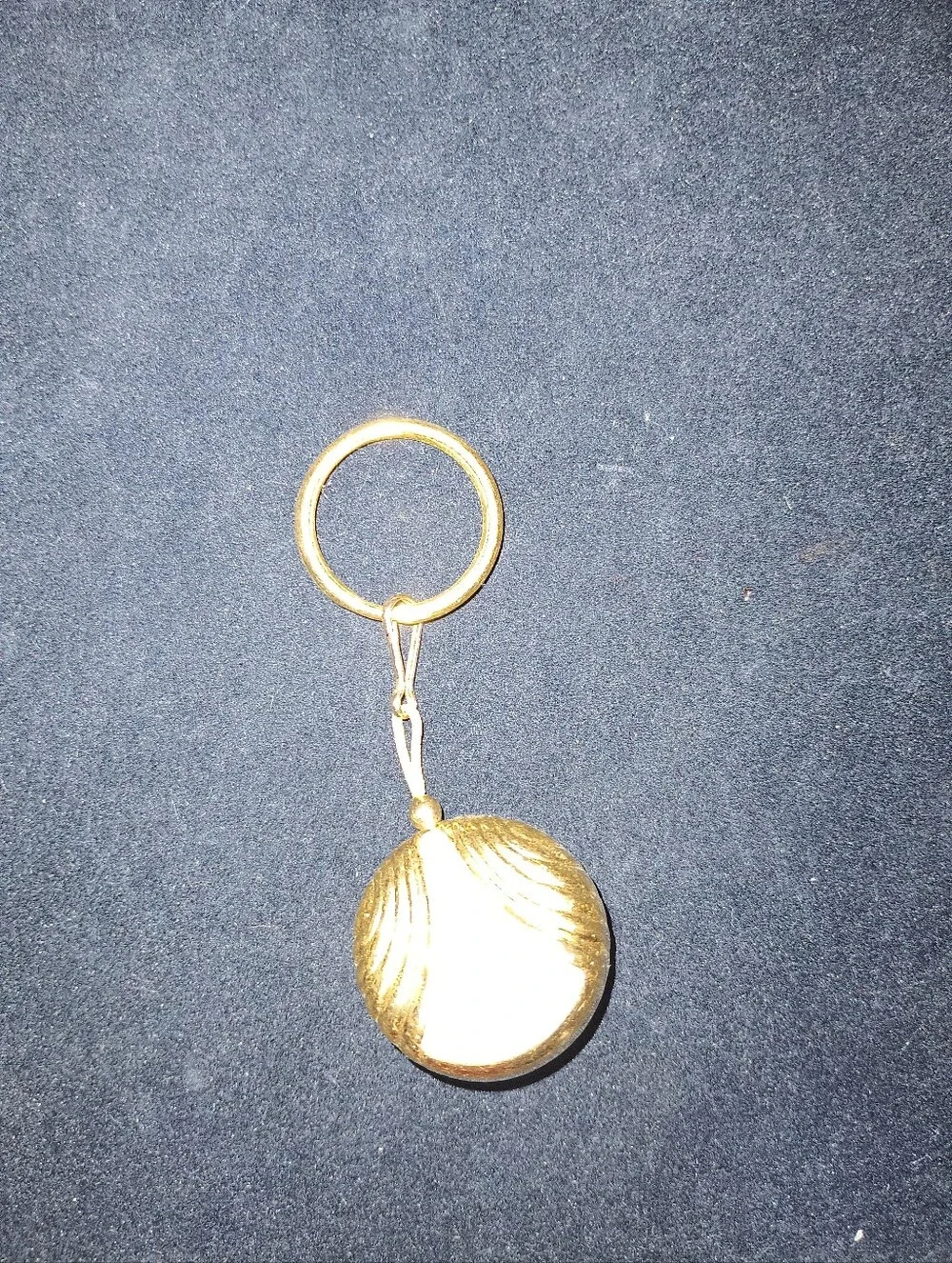 Vintage Avon Badge Reel. Gold Tone With Pearlesque Center